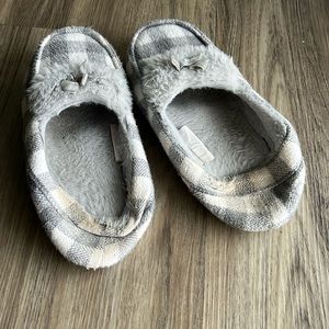 Well worn women’s slippers